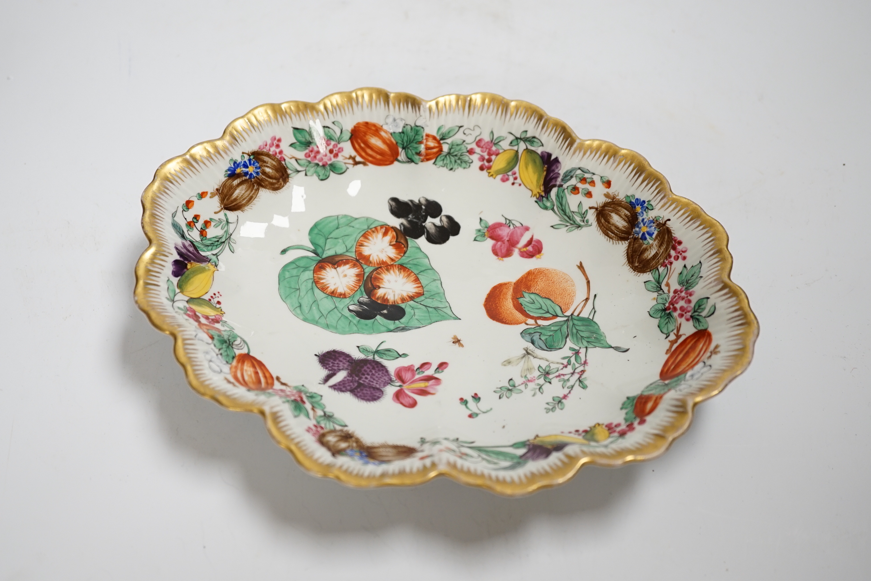 A Continental flower and insect painted dish and a Samson Chelsea style figure, 18cm